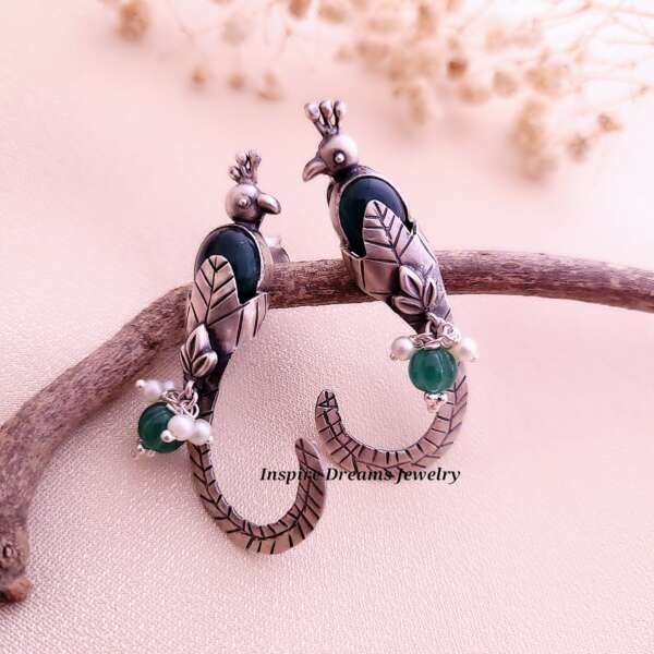 TWIN BIRD EARRINGS WITH GREEN STONE