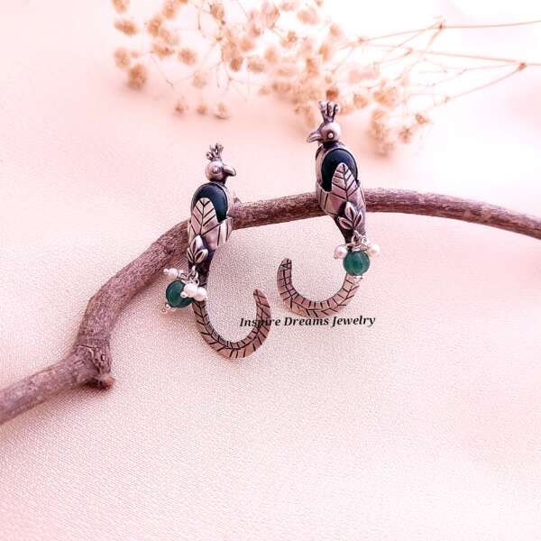 TWIN BIRD EARRINGS WITH GREEN STONE - Image 2