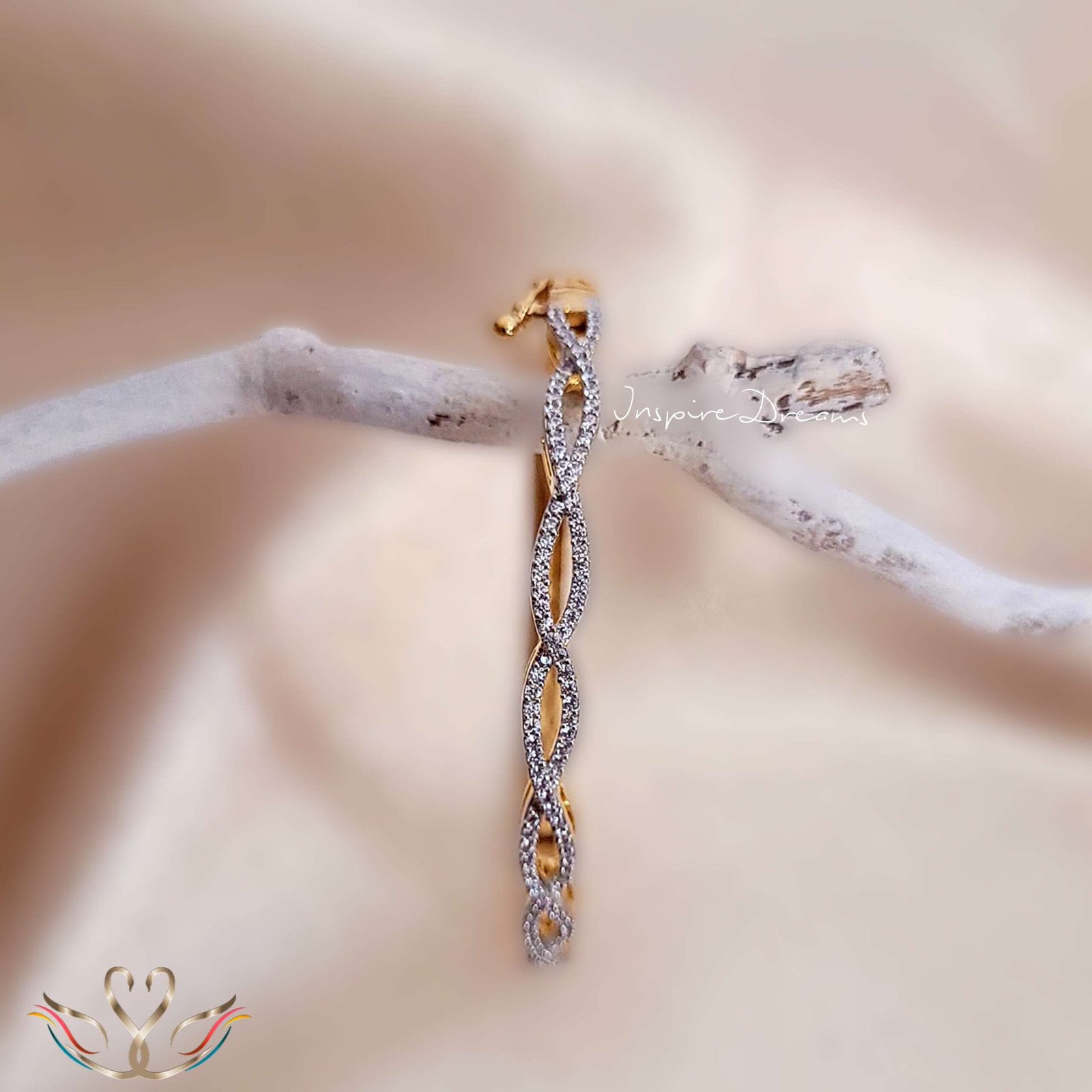 Gold Tone Cz Interplay Interlocking Loop Bracelet Bangles